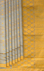Khaki Mulberry Silk Saree with Yellow Border and Buttis & Motifs