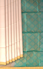 Beige Soft Silk Saree with Sea Green Border and Bhutta Motifs