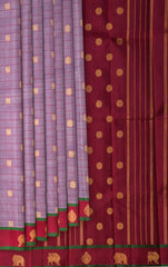 Greyish Lilac Kanchipuram Pure Zari and Handloom Saree with Peacock and Chakram Butta