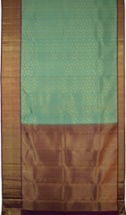 Copper Sulphate Blue Kanchipuram Silk Saree with Floral Jackard on the body with Wine Purple contrast border and Wine Purple Grand Pallu with mango design pallu