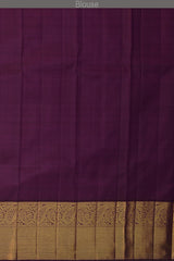 Copper Sulphate Blue Kanchipuram Silk Saree with Floral Jackard on the body with Wine Purple contrast border and Wine Purple Grand Pallu with mango design pallu