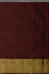 Dark Green Kanchipuram Silk Saree with Motif Leaf Plain on the body with Arakku Brown contrast border and Maroon Yaali, peacock, kamalam pallu