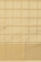 Off White Kanchipuram Silk Saree with Zari Checks on the body with Off White self border and off white grand pallu with diagonal lines. Intricatetly designed with mangoes, rudraksham and Aramadam