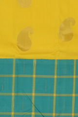 Yellow Kanchipuram Silk Saree with Half half- Mango Plain on the body with Turqoise Blue contrast Checks raindrops border and Turqoise Blue 8 Kol grand tissue pallu with seepu raku
