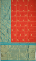 Chilli Red Kanchipuram Silk Saree with Checks on the body with Turqoise Blue contrast Lotus Border and Blue Blue Tissue Pallu. Grand.