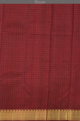 Maroon Kanchipuram Silk Saree with Jackard Jackard - Tear body with Mango Bavanchi Self border and Grand Maroon Pallu with Embossed Flower Motif with Basket Weave Pattern