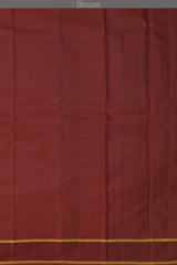 Bottle Green Kanchipuram Silk Saree with Butta peacock on the body with Maroon contrast border and Grand Maroon Pallu Intricately design Semi circle pattern with mango motif