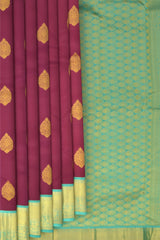 Purple Kanchipuram Silk Saree with Blue contrast border and Blue Pallu with tear shaped motif and annam