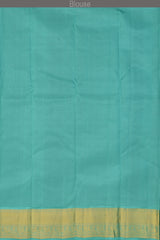 Purple Kanchipuram Silk Saree with Blue contrast border and Blue Pallu with tear shaped motif and annam