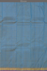 Blue Kanchipuram Silk Saree with Purple contrast border and Dull Blue Pallu with Mango Motif