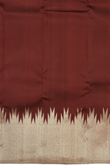 Maroon Kanchipuram Silk Saree with temple border on the body with Maroon self border and Maroon Grand Tissue Pallu