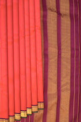 Orange Kanchipuram Silk Saree with Diamond with Mango on the body with Purple contrast border and Seet Mundhi with gatti zari