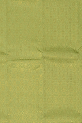 Lime Green Kanchipuram jacquard Silk Saree with embossed diamond design on the body with lavender contrast border and pallu