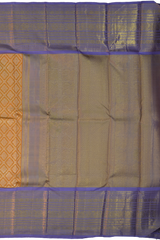 Light Orange Kanchipuram Silk Saree with large diamond motif design on the body with lavender contrast border featuring varusai pet border and annam, small diamond designs in pallu