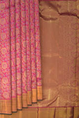 Pink Kanchipuram jacquard, embossed Silk Saree with floral motif designs on the body with self getti / kuyil kann border and floral design / kutti diamond mango motif designs in pallu