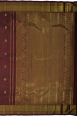 Coffee Brown Kanchipuram Silk Saree with checks and podi zari kattam with kamalam butta designs on the body with self kuyil kann with kolam design border and floral with diamond design and hexagon varisapet designs in pallu