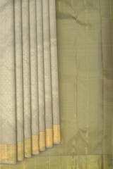 Light Lavender Kanchipuram Silk Saree with intricate diamond butta design on the body with self floral with cross lines border and grand diamond design pallu