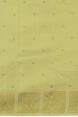 Cardamom Light Green Kanchipuram Silk Saree with small round butta design on the body with self unique block checks border and grand pallu with kuyil kan and retta kili (2 parrots) designs