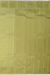 Cardamom Light Green Kanchipuram Silk Saree with small round butta design on the body with self unique block checks border and grand pallu with kuyil kan and retta kili (2 parrots) designs