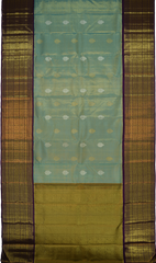 Light Blue Kanchipuram Tissue Silk Saree with embossed designs on the body with violet contrast border and annam, gatti pallu, and grand designs in pallu