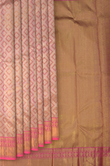 Baby Pink Kanchipuram jacquard Silk Saree with embossed and brocade designs on the body with dark candy pink contrast border and rich grand intricately designed pallu