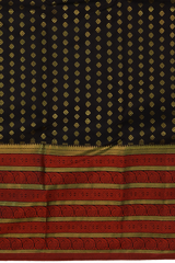 Black Kanchipuram Silk Saree with vertical chakram butta, brocade design on the body with red contrast border and rope design with red threadwork pallu