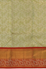 Light Green Kanchipuram Silk Saree with Tissue, Embossed, Meenakari, Brocade on the body with red contrast border and pallu featuring rudraksham, grand, creeper design with rich pallu