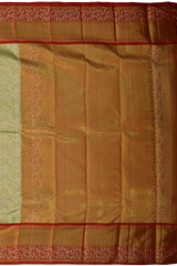 Light Green Kanchipuram Silk Saree with Tissue, Embossed, Meenakari, Brocade on the body with red contrast border and pallu featuring rudraksham, grand, creeper design with rich pallu