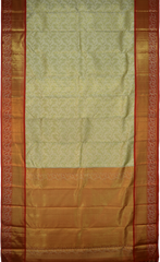 Light Green Kanchipuram Silk Saree with Tissue, Embossed, Meenakari, Brocade on the body with red contrast border and pallu featuring rudraksham, grand, creeper design with rich pallu