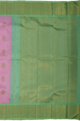 Rose milk pink Kanchipuram Silk Saree with Motif on the body with pista green contrast border and pallu featuring annam, rudraksham, grand, zig zag pattern intricately designed