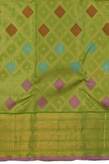 Lime green Kanchipuram Silk Saree with Tissue, Embossed, Meenakari, Diamond design with multicolour threadwork on the body with light green with lavender selvage contrast border and pallu featuring grand, floral intricately designed grand pallu
