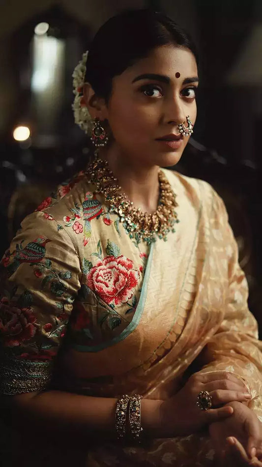 Shriya Saran Embraces Elegance in Sarees