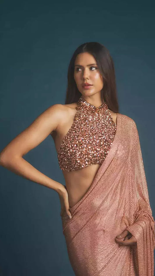 Sonam Bajwa Stuns in a Glamorous Rose Gold Saree, Oozing Modern Sophistication