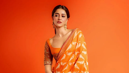 Christmas Glow: Ananya Panday Dazzles in Vibrant Orange Banarasi Elegance