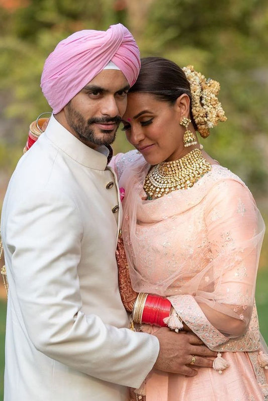 Neha Dhupia & Angad Bedi Redefine Wedding Guest Fashion With Simple, Elegant Looks
