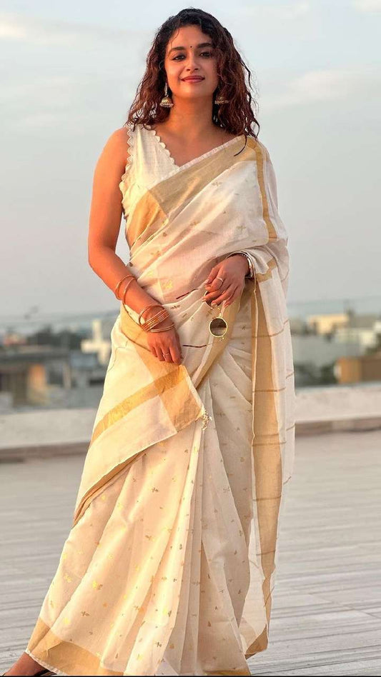 Keerthy Suresh Radiates Sophistication and Charm in a Classic Ivory Saree Adorned with Gold Motifs