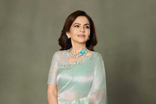 Nita Ambani Radiates Luxe Glamour in a Sequined Manish Malhotra Saree and Rare Hermès Jewellery Bag for Diwali