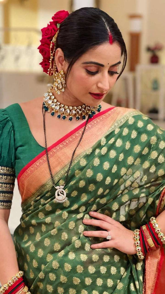 Aishwarya Sharma Radiates Regal Charm in a Timeless Banarasi Silk Saree
