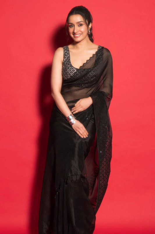 Shraddha Kapoor Dazzles in an Elegant ₹62,000 Devnaagri Black Organza Saree at Saudi Event