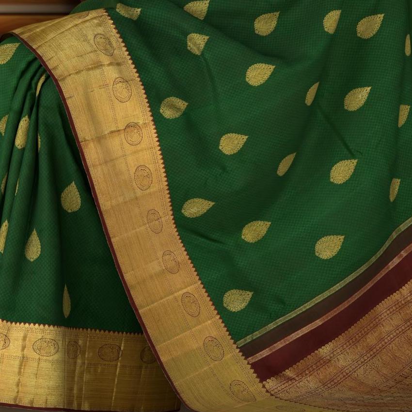 Dark Green Kanchipuram Silk Saree with Motif Leaf Plain on the body with Arakku Brown contrast border and Maroon Yaali, peacock, kamalam pallu