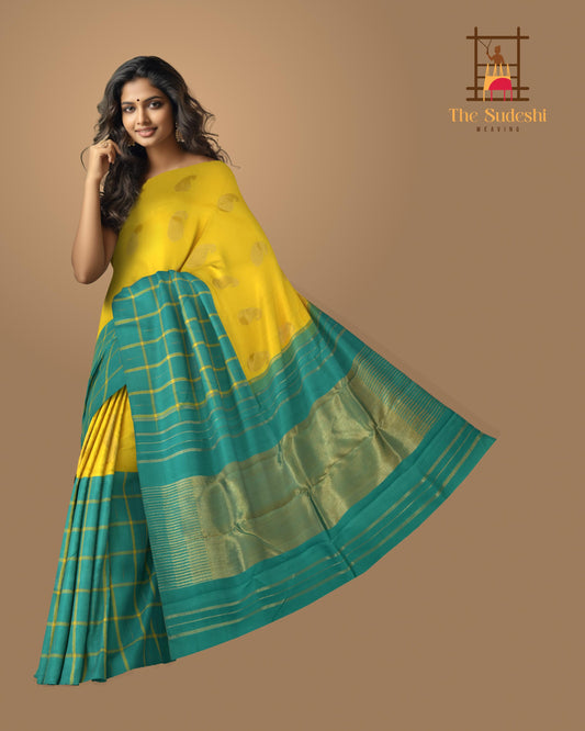 Yellow Kanchipuram Silk Saree with Half half- Mango Plain on the body with Turqoise Blue contrast Checks raindrops border and Turqoise Blue 8 Kol grand tissue pallu with seepu raku