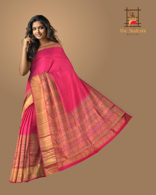 Rani Pink Kanchipuram Silk Saree with Jackard Half and half saree. Half with Mayil, Yaali checks motif. Other half is plain body with Semi circle border and Pink Rudraksham with Annapakshi Checks Pallu