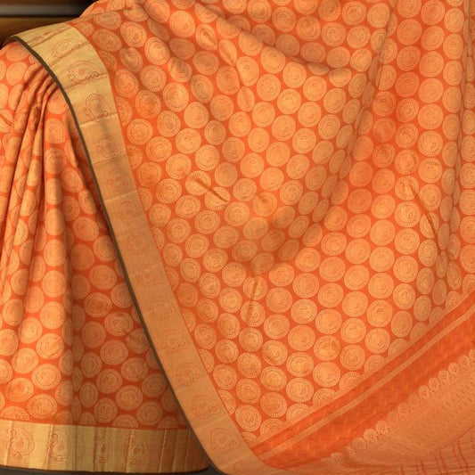 Saffron Orange Kanchipuram Silk Saree with Jackard Round Annam body with Mango Self border and Saffron Orange Grand diamond design with Kamalam motif Pallu