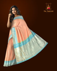 Light Peach Kanchipuram Silk Saree with Plain Silver Zari body with Temple Contrast border and Grand Powder Blue Tissue Pallu with silver zari