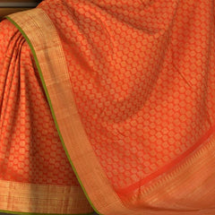 Chilli Red Kanchipuram Silk Saree with Plain Annapakshi and Rudraksham body with Smal line design Contrast border and Red Pallu with rudraksham, mango, intricately designs