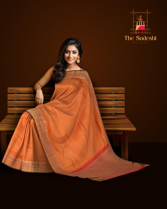 Saffron Orange Kanchipuram Silk Saree with Jackard Small leaf body with Elephant and Yaali Contrast border and Pink Pallu with Simha/ Singam Motif with intricate zig zag pattern