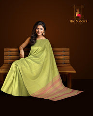 Green Kanchipuram Silk Saree with Tissue Plain Tissue body with Plain Self border and Pink Tissue Pallu with green lines