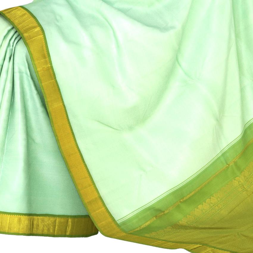 Light Green Kanchipuram Silk Saree with Plain Silk Saree body with Diamond Contrast border and Light Green Pallu with Diamond Motif and floral Pattern