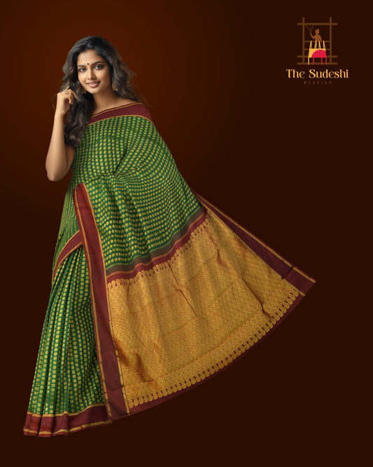Bottle Green Kanchipuram Silk Saree with Butta peacock on the body with Maroon contrast border and Grand Maroon Pallu Intricately design Semi circle pattern with mango motif