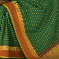 Bottle Green Kanchipuram Silk Saree with Horizontal Neli on the body with Orange and Maroon dual color border and Grand Maroon Pallu with Peacock, Rudraksham with Coin Buttas with diamond lines